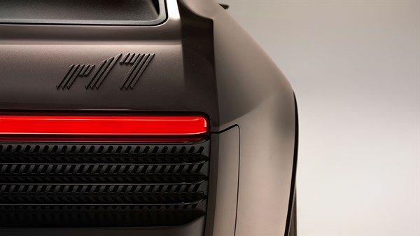 Detajl zadnjega dela vozila Renault z rdečim LED svetlobnim trakom.