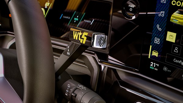 Prestavne ročice e-pop v notranjosti Renault 5 E-Tech, s prikazom zaslona multimedijskega sistema.