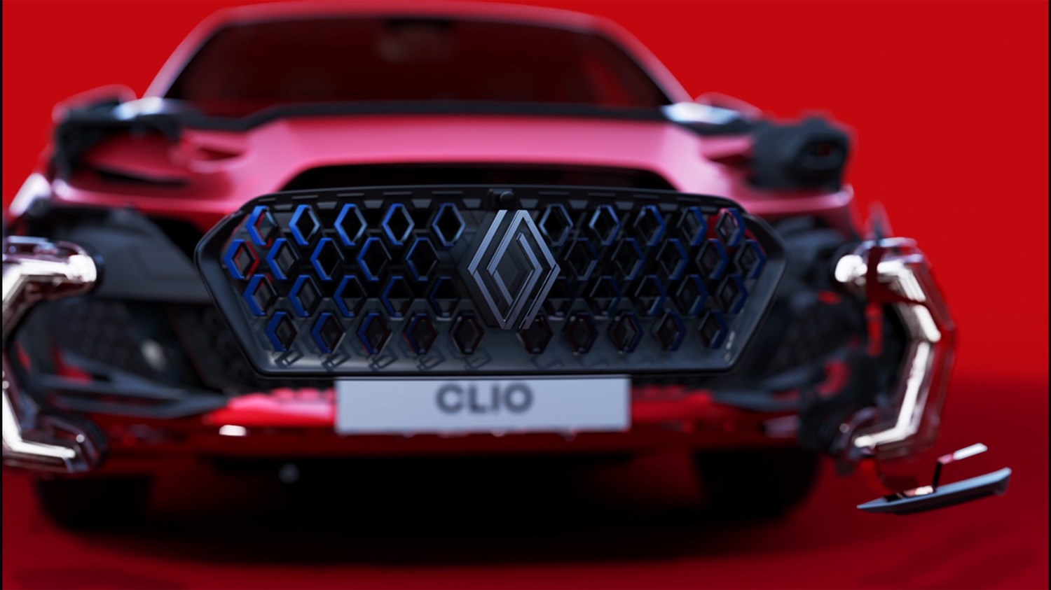 Nova maska Renault Clio z osvetljenim logotipom in dinamično obliko poudarja sodoben dizajn in eleganco.