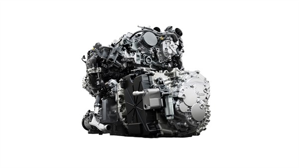 Na belem ozadju je prikazal dizelski motor vozila Renault Trafic.
