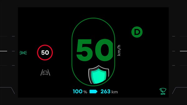 Digitalni prikazovalnik v vozilu s prikazom hitrosti (50 km/h) in ikono ščita za varnostni nadzor.