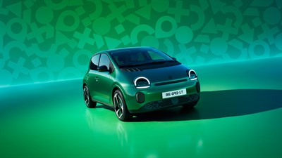 Pisani napis “Twingo” v geometričnih oblikah in barvah na modrozeleni podlagi.
