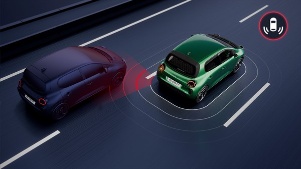 Shematski prikaz zelenega Renault Twingo z opozorilom na približevanje vozila od zadaj v mrtvem kotu.