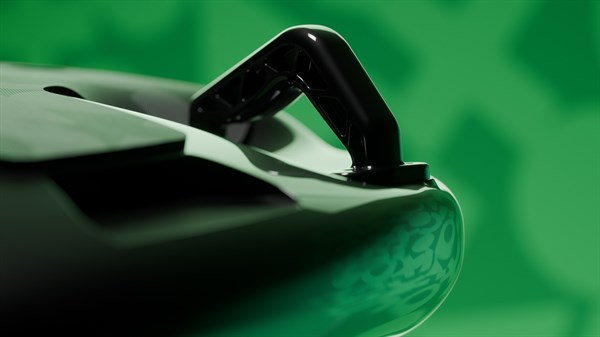 Črno-zelen vodni pogonski modul Mo-jet z ročajem v bližnjem posnetku.