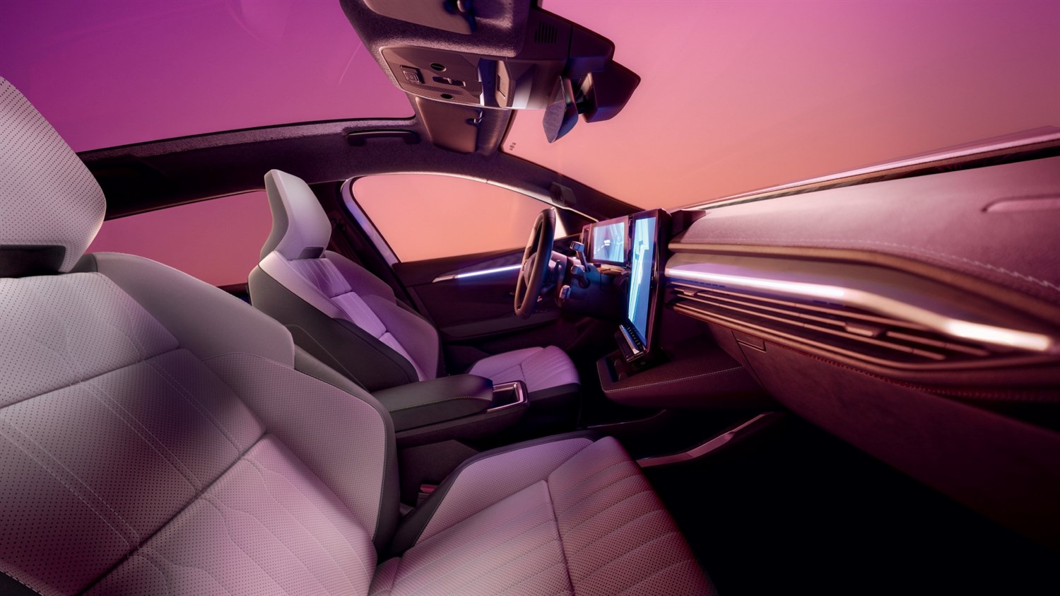 Notranjost vozila Renault Scenic E-Tech electric z armaturno ploščo, zasloni in ambientalno osvetlitvijo.