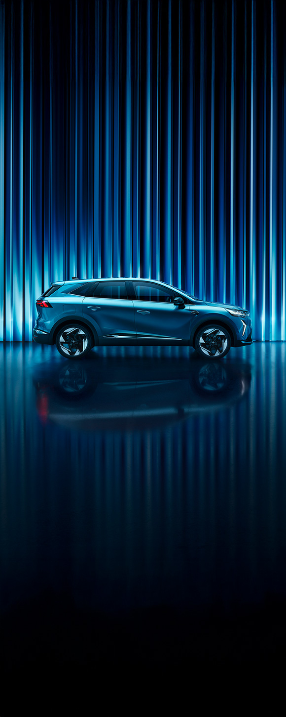 Modri Symbioz, pogled iz strani, osvetljen z modro svetlobo.