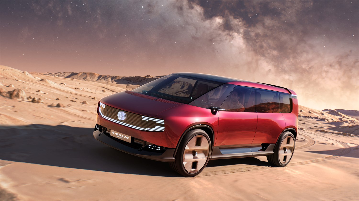 Rdeči E-Space Concept - sprednji bočni pogled v puščavski pokrajini pod zvezdnatim nebom.