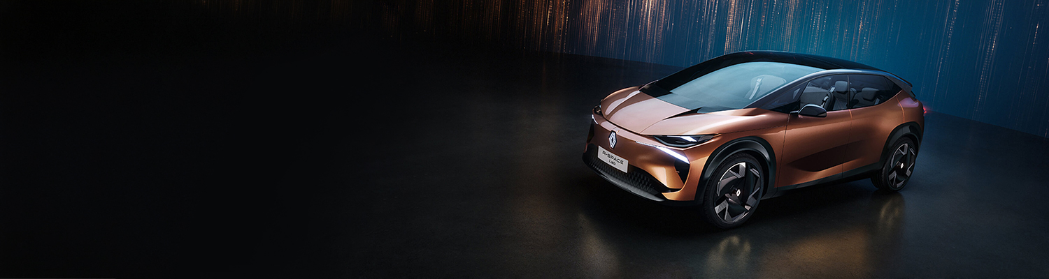 Konceptno vozilo Renault R-Space Lab v bakreni barvi s čisto silhueto in enoprostorsko arhitekturo, prikazano od spredaj.