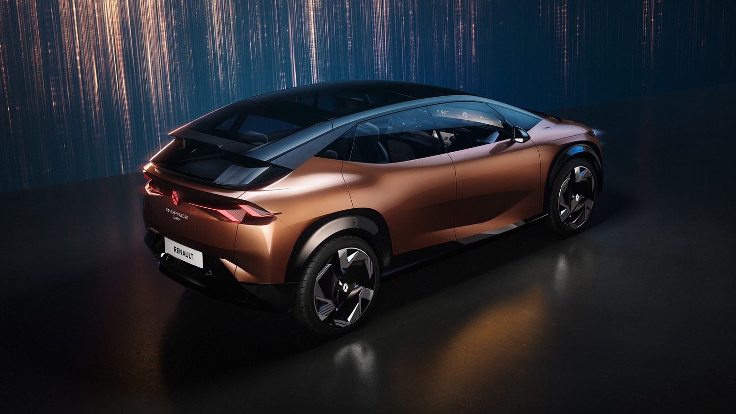 Renault R-Space Lab koncept, pogled od zadaj na bakreno vozilo z aerodinamično silhueto.